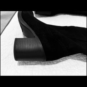 Black knee-high boots